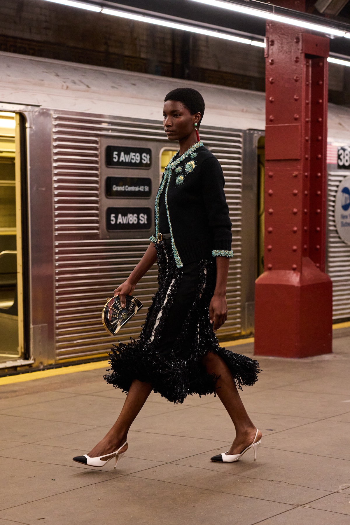 Chanel Métiers d'Arts collection on the subway platform