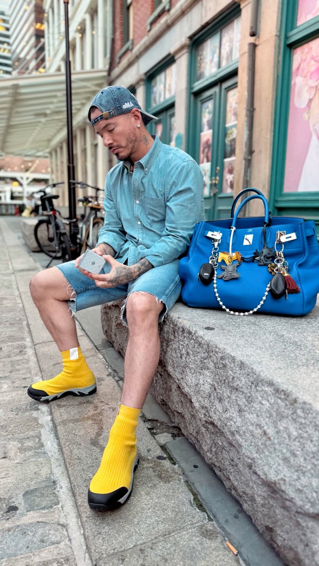 J. Balvin with the Motorola Swarovski Razr
