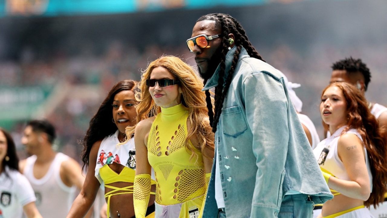 Shakira and Burna Boy stand side by side during their "Dai Dai" performance at the 2026 World Cup opening ceremony