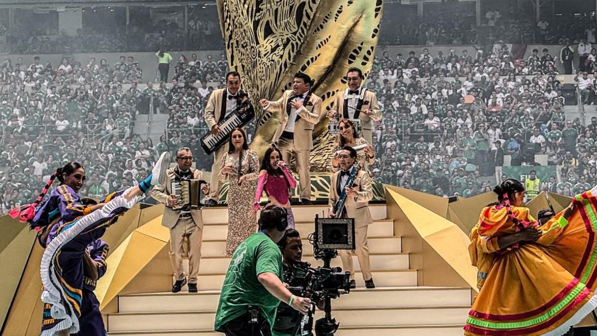Belinda sings at center stage with Los &Aacute;ngeles Azules during their "Por Ella" performance at the 2026 World Cup opening ceremony
